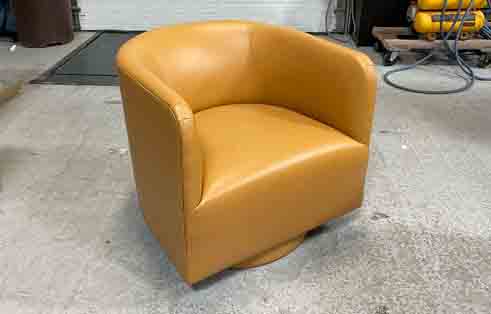 Upton Swivel Chair in Nuhide Leather by CR Laine
