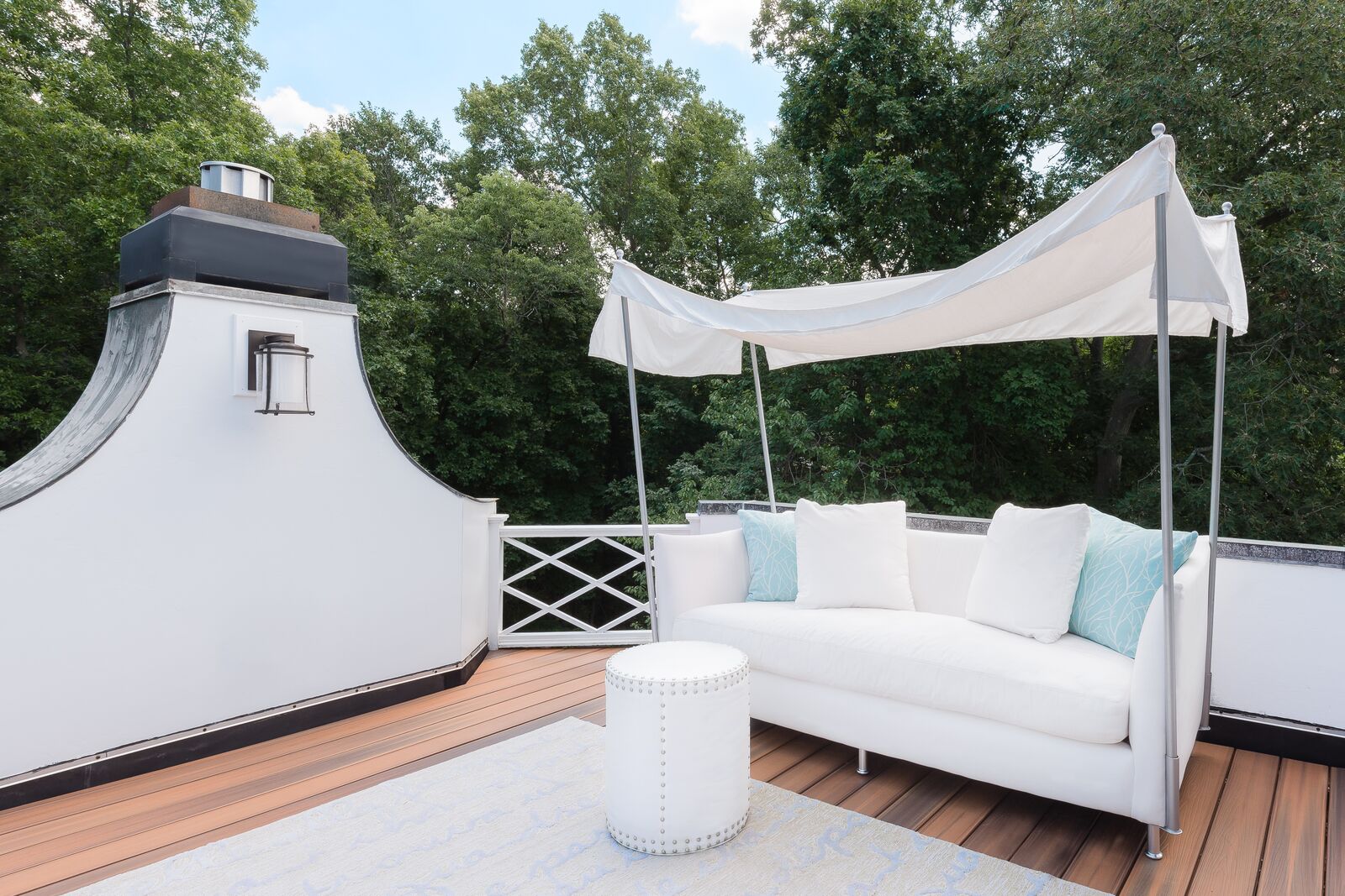 deck with couch and canopy