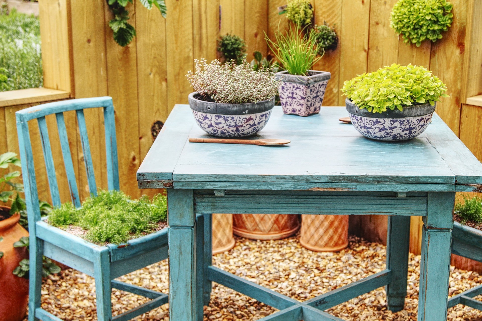 wooden chair and table in teal