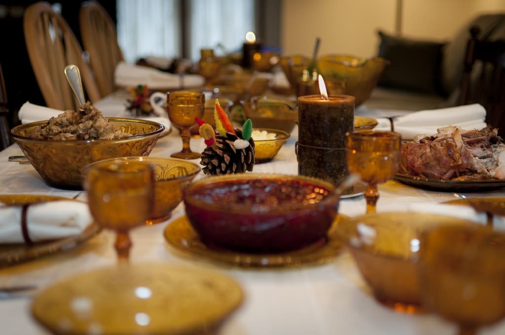 rustic tablescape with pinecones and candles