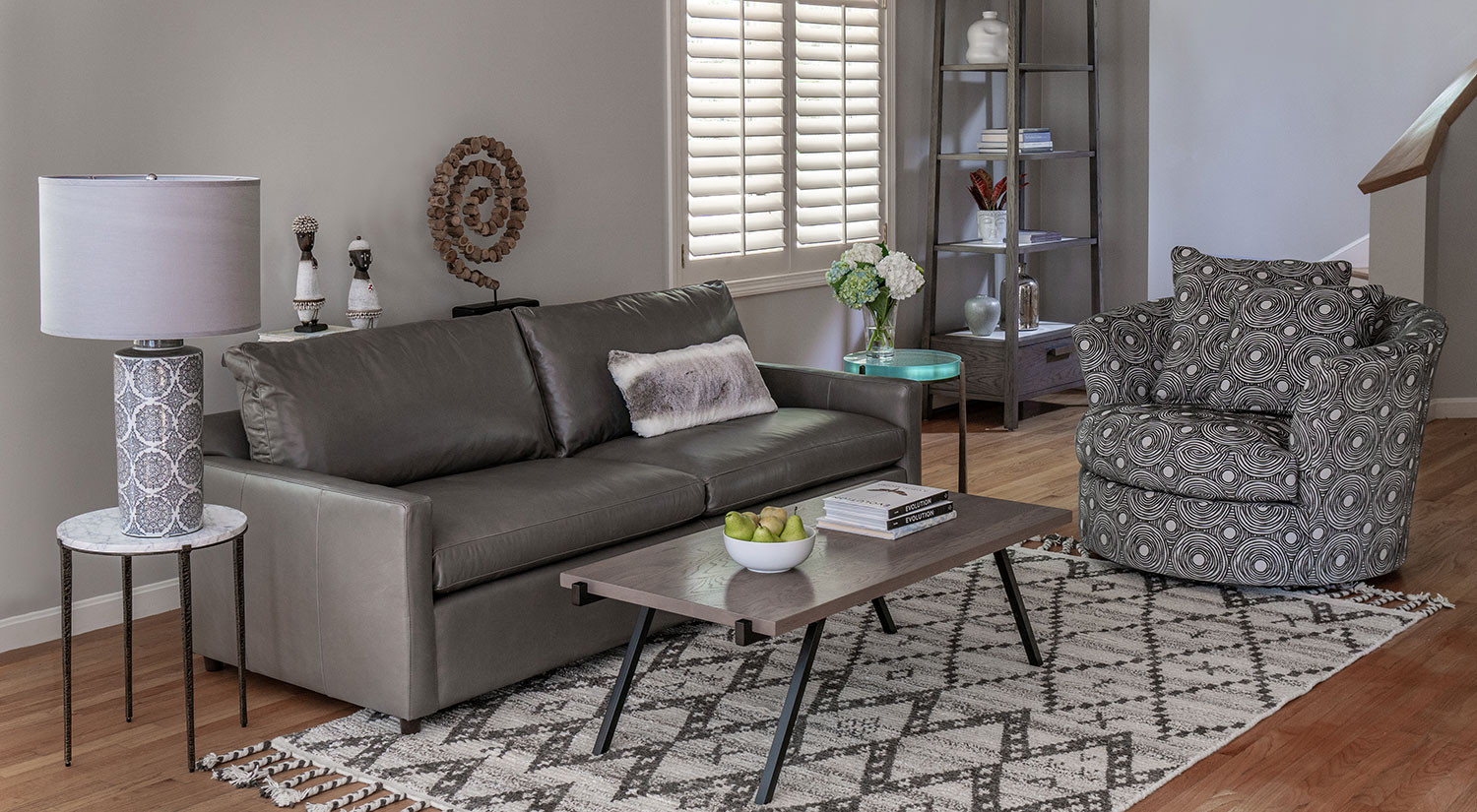 living room with a gray leather couch