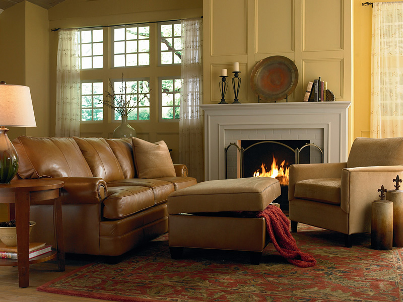 a cozy living room featuring an Evanston Sofa by Norwalk Furniture