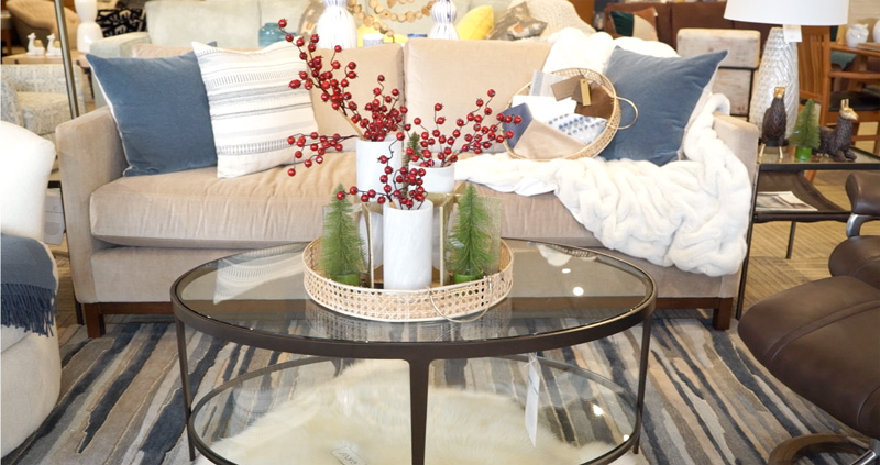 coffee table centerpiece and couch pillows with seasonal colors 